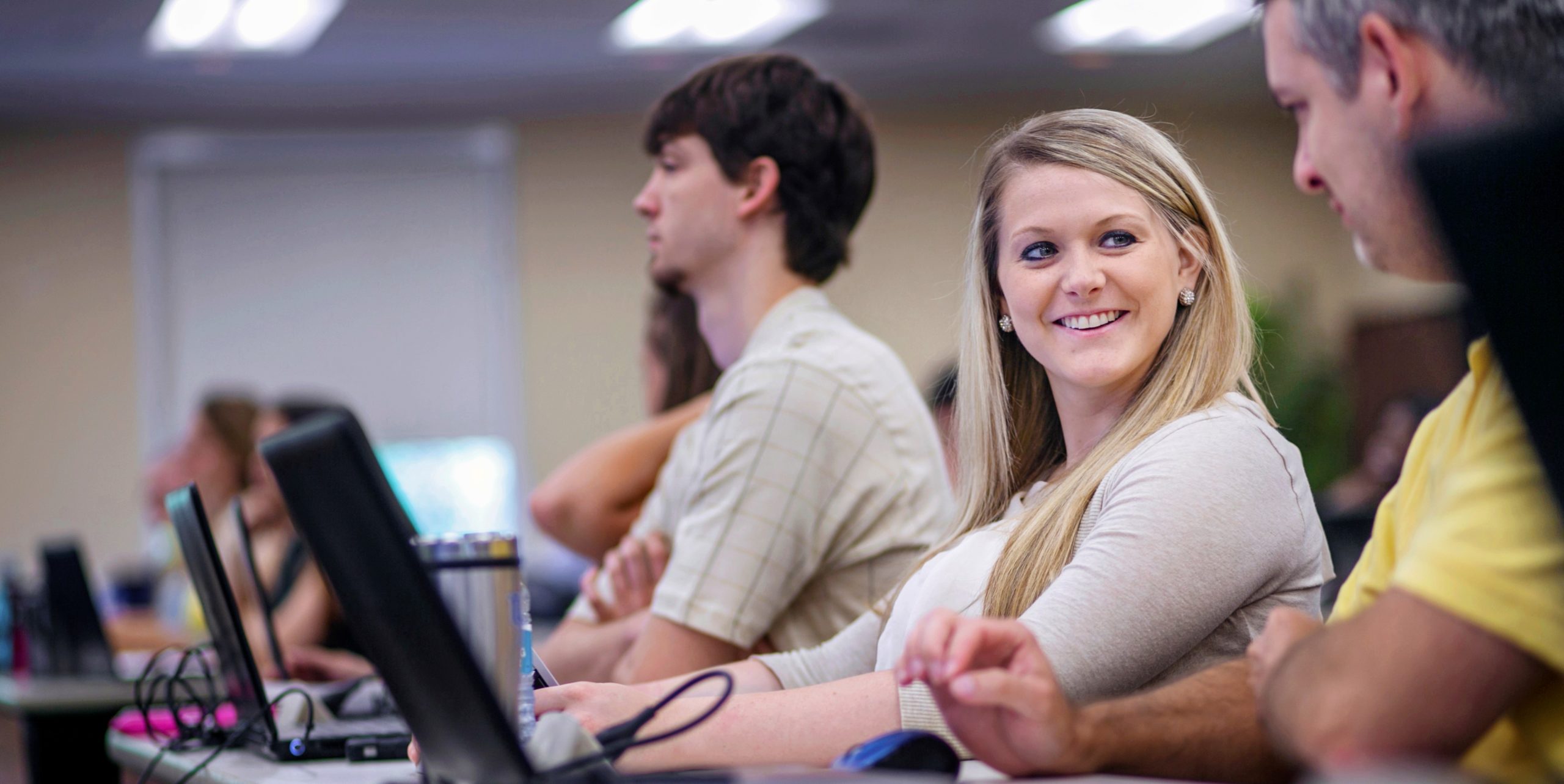 students in class smiling