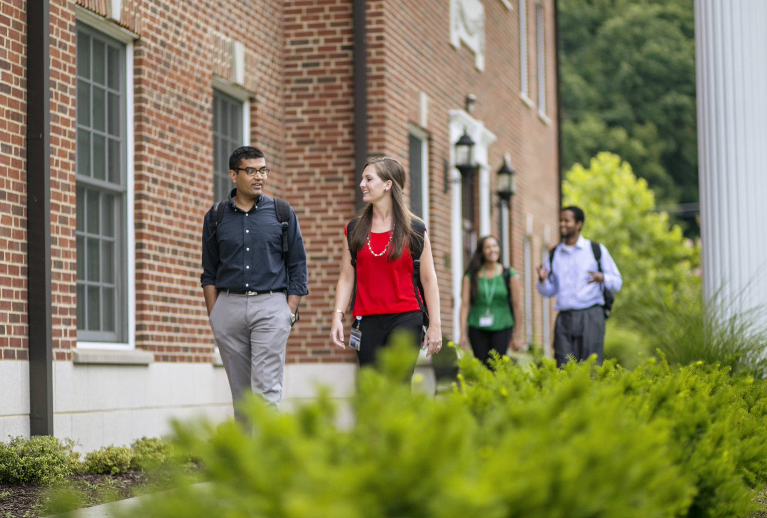 students walking on campus